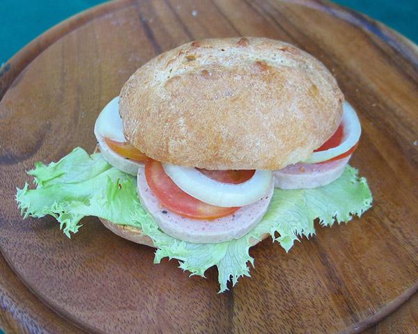 Bread Roll with Meat Sausage, Onion, Salad & Tomato